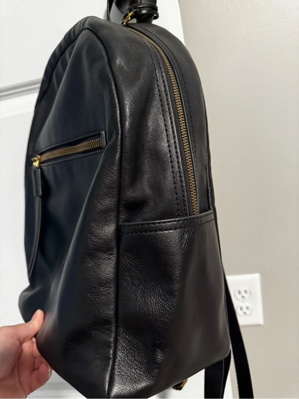 Fossil Black Leather Backpack with Gold Zip Accent